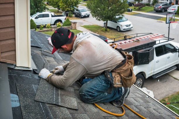 Professional Flat Roof Repair technician working in Kenney, TX